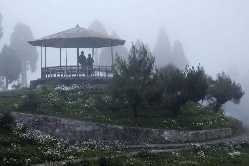 A romantic moment in the misty morning at Jorpokhri